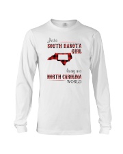 SOUTH DAKOTA GIRL LIVING IN NORTH CAROLINA WORLD Long Sleeve Tee tile