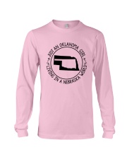 OKLAHOMA GIRL LIVING IN NEBRASKA WORLD Long Sleeve Tee tile