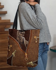 Dinosaur Leather All-over Tote aos-all-over-tote-lifestyle-front-09