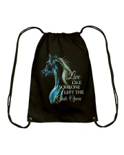Live Like Someone Drawstring Bag tile