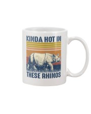 Kinda hot in these rhinos Mug tile