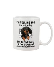 Dog telling you i'm not a dog Mug tile