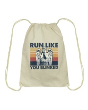 Run like you blinked Drawstring Bag tile