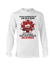 Never underestimate Books December Long Sleeve Tee tile