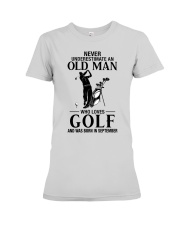 Never underestimate an old man who loves golf and was born in september Premium Fit Ladies Tee tile