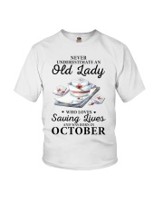 never underestimate an old lady October nurse Youth T-Shirt tile