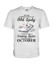 never underestimate an old lady October nurse V-Neck T-Shirt tile