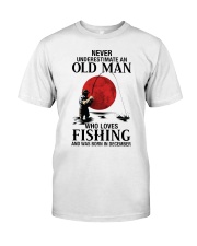Never Underestimate Old Man Fishing December Premium Fit Mens Tee tile