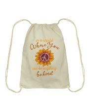 In a world Drawstring Bag thumbnail