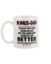 THANKS FOR PUTTING UP WITH MY MOM Mug back