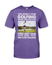 YOU DON'T STOP PLAYING WHEN YOU GET OLD Premium Fit Mens Tee tile