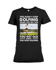 YOU DON'T STOP PLAYING WHEN YOU GET OLD Premium Fit Ladies Tee tile