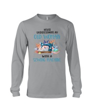 An Old Woman With A Sew Machine Long Sleeve Tee thumbnail
