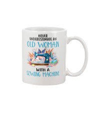 An Old Woman With A Sew Machine Mug front
