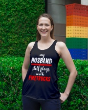 Firefighter My Husband Still Plays With The Trucks Ladies Flowy Tank lifestyle-bellaflowy-tank-front-2