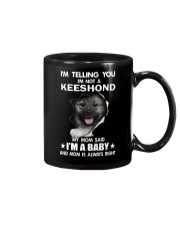 i'm telling you i'm not a keeshond Mug thumbnail