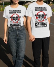 Never Underestimate The Therapeutic Power Being In The Garage Shirt Machinist Gift Ideas Classic T-Shirt apparel-classic-tshirt-lifestyle-front-145