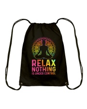 Yoga Relax Nothing is under control man Drawstring Bag tile