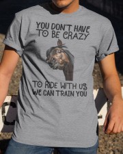 You don't have to be crazy to ride with us Classic T-Shirt apparel-classic-tshirt-lifestyle-28