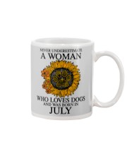 A Woman Who Loves Dogs And Was Born In July Mug tile
