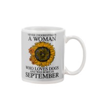 A Woman Who Loves Dogs And Was Born In September Mug tile