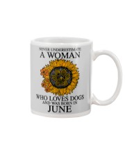 A Woman Who Loves Dogs And Was Born In June Mug tile