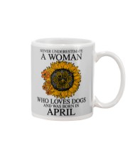A Woman Who Loves Dogs And Was Born In April Mug tile