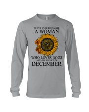 A Woman Who Loves Dogs And Was Born In December Long Sleeve Tee tile