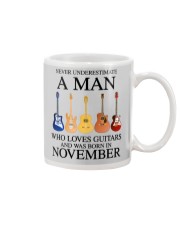 A Man Who Loves Guitar And Was Born In November Mug tile