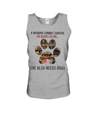 Woman Needs Dogs To Survive On Books Unisex Tank tile