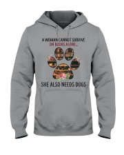 Woman Needs Dogs To Survive On Books Hooded Sweatshirt tile