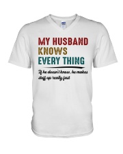 never underestimate woman V-Neck T-Shirt tile