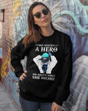 She needed a hero so that's what she became Crewneck Sweatshirt lifestyle-unisex-sweatshirt-front-3