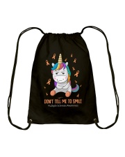 Don't tell me to smile Drawstring Bag tile