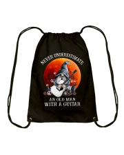 Never underestimate an old man Drawstring Bag tile