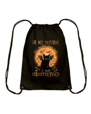 In my defense Drawstring Bag tile