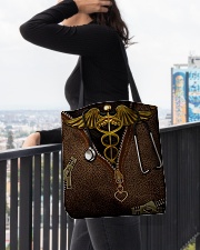 Nurse tote lthr dvhd-cva All-over Tote aos-all-over-tote-lifestyle-front-05
