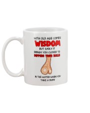 Dipping Balls In Water Mug back