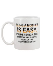 Mother riding on fire Mug back