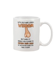 Dipping Balls In Water Mug front