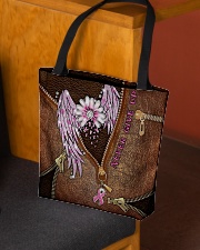 Never give up Leather pattern print All-over Tote aos-all-over-tote-lifestyle-front-02