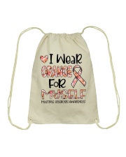 I wear orange Drawstring Bag tile