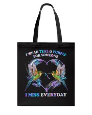 I wear teal and purple Tote Bag tile