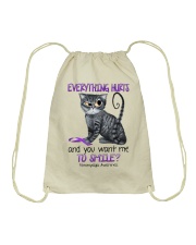 Everything hurts and you want me to smile Drawstring Bag tile