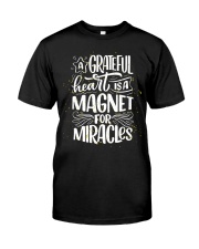 A GRATEFUL HEART IS A MAGNET FOR MIRACLES Premium Fit Mens Tee tile