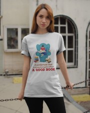A Comfortable Chair Is No Use To Anyone Without A Good Book (Front) Classic T-Shirt apparel-classic-tshirt-lifestyle-19