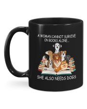 A Woman Cannot Survive On Books Alone She Also Needs Dogs Mug back