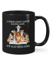 A Woman Cannot Survive On Books Alone She Also Needs Dogs Mug front