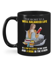 The Secret To A Well Balanced Life - A Cup Of Coffee - A Book Mug back