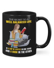 The Secret To A Well Balanced Life - A Cup Of Coffee - A Book Mug front